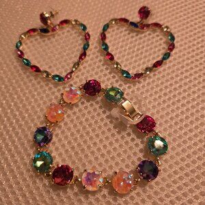 Costume bracelet in hues of blue, pink, gold with matching heart shaped earrings